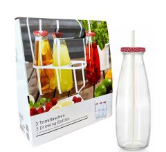 3 drinkflessen met rietje in een wit metalen flessenrek